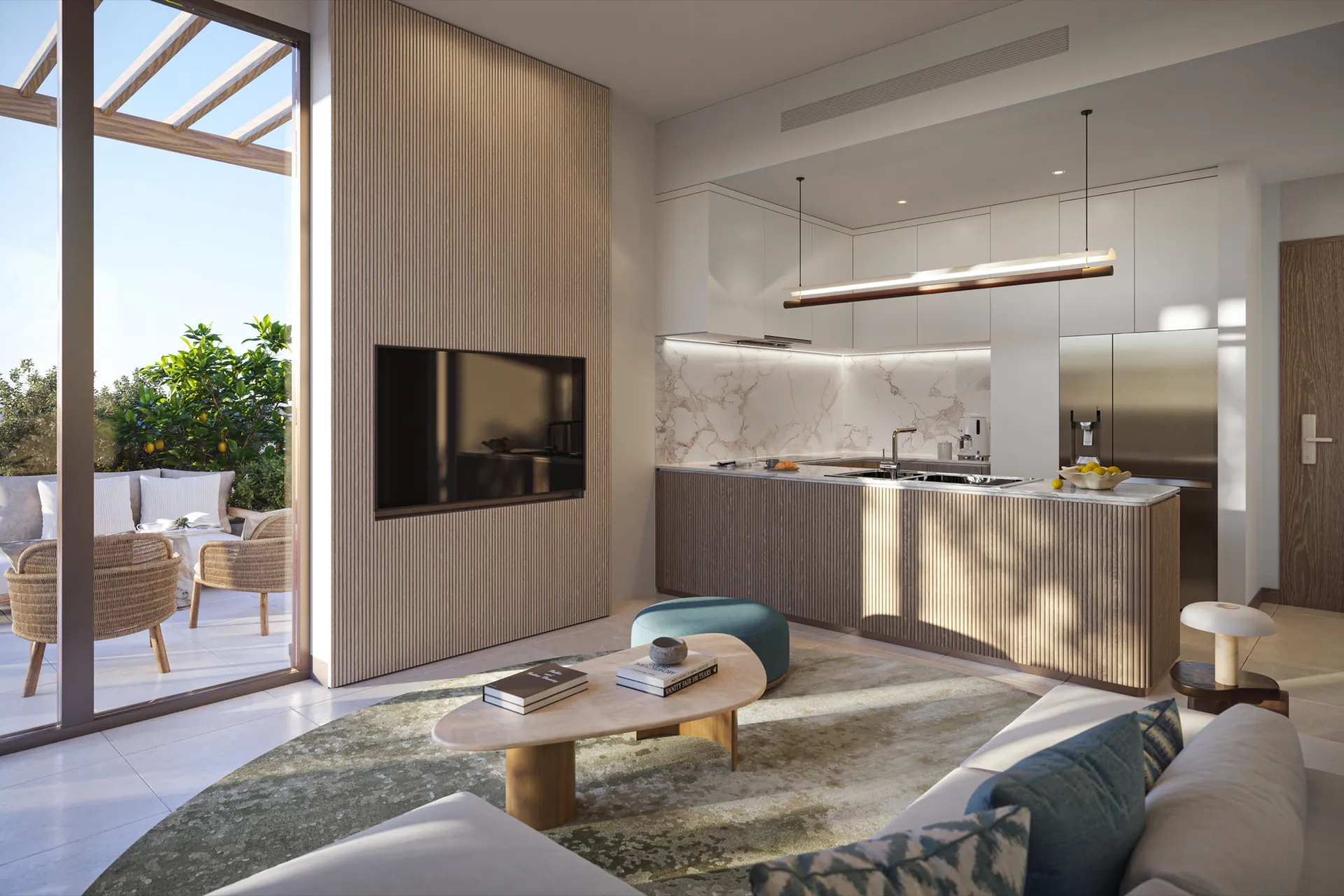 Living room opening to the kitchen and terrace at Melograno Yards by Beyond