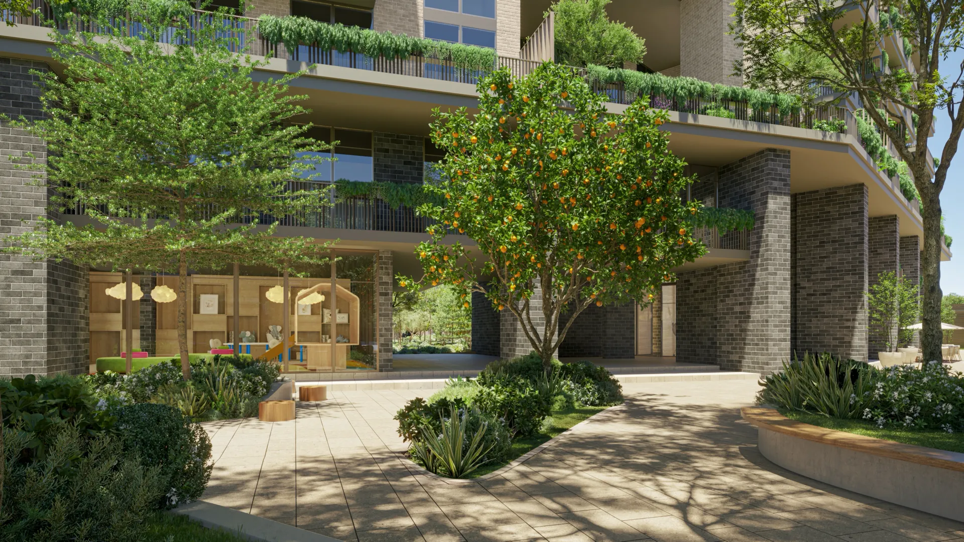 Landscaped arrival court outside an apartment lobby at Melograno Yards by Beyond