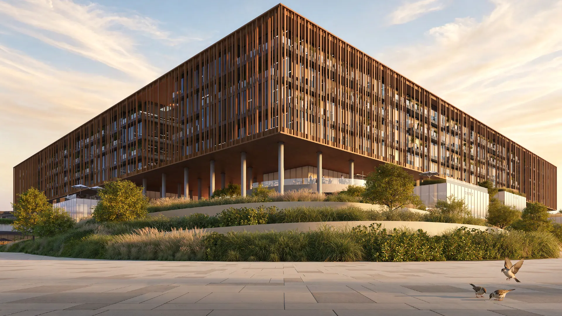Louvered façade of The Yards Plaza above a landscaped podium