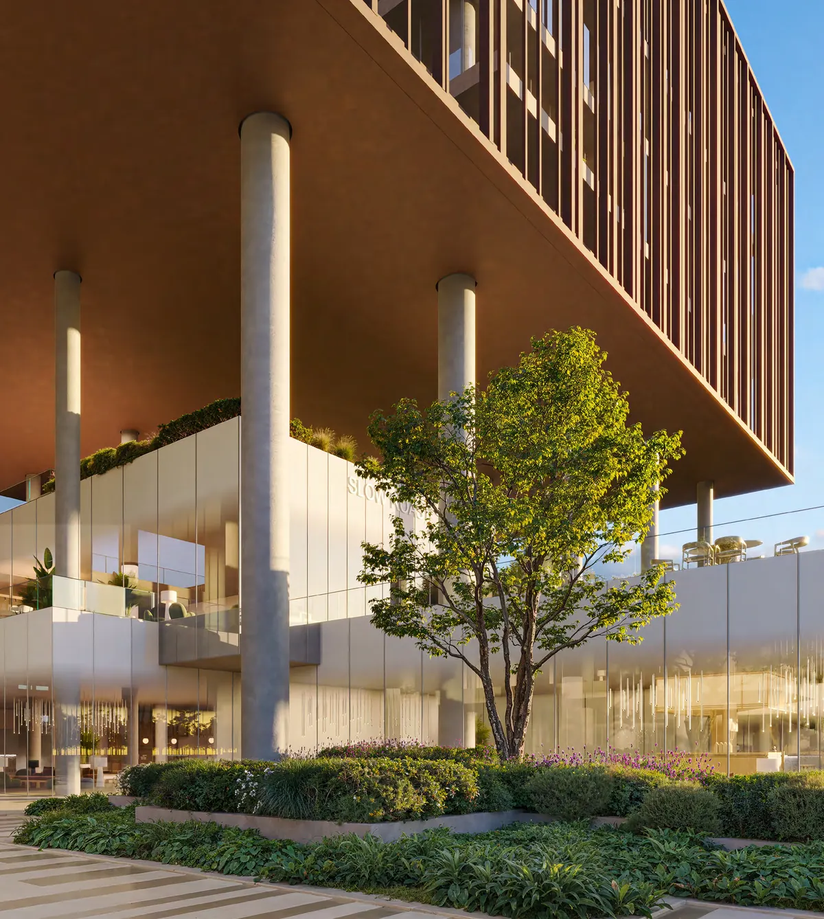 Landscaped podium terrace beneath the façade of The Yards Plaza